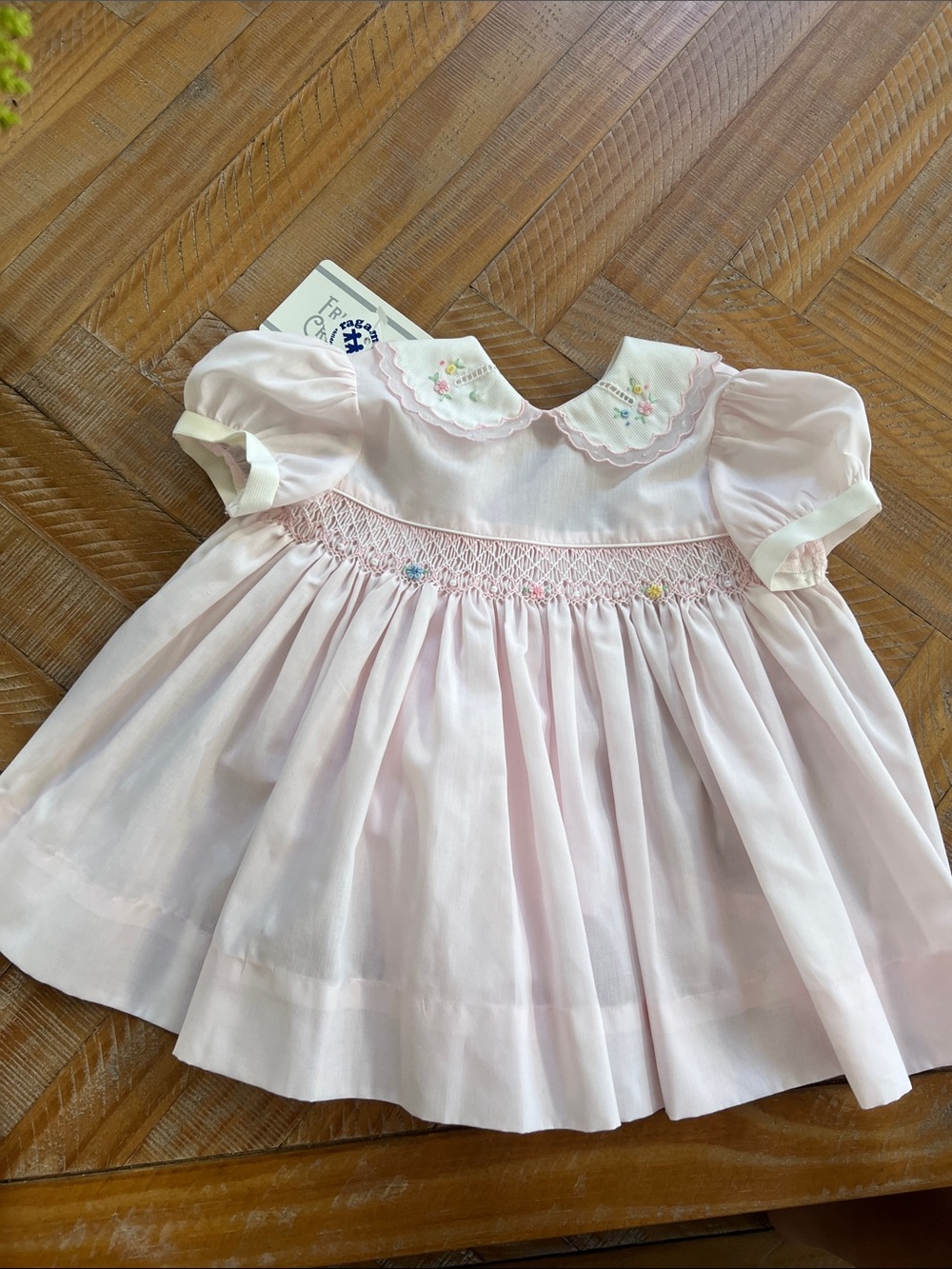 Friedknit creations Classic Smocked Pink Baby Dress with Peter Pan Collar